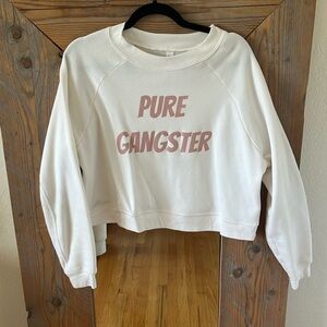 Cropped sweater ‘Pure Gangster’. Off white with soft pink text. Size M